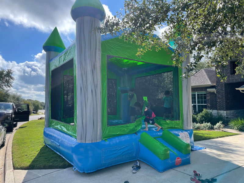 Children are enjoying in bounce house  in Austin area